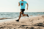 t-shirt-mockup-of-a-man-running-featuring-the-sea-in-the-background-37870-r-el2_1_optimized_100