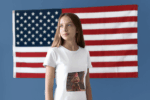 woman-wearing-a-t-shirt-mockup-in-a-room-with-an-american-flag-a20700_2_optimized_100
